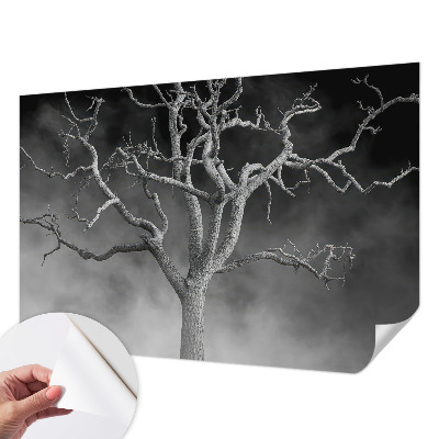 Nursery wall mural with a misty tree design