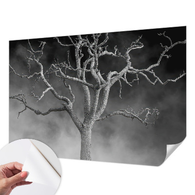 Nursery wall mural with a misty tree design