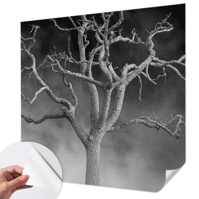 Nursery wall mural with a misty tree design