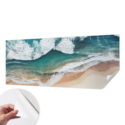 Peel and stick wall mural with a sea waves design
