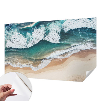 Peel and stick wall mural with a sea waves design