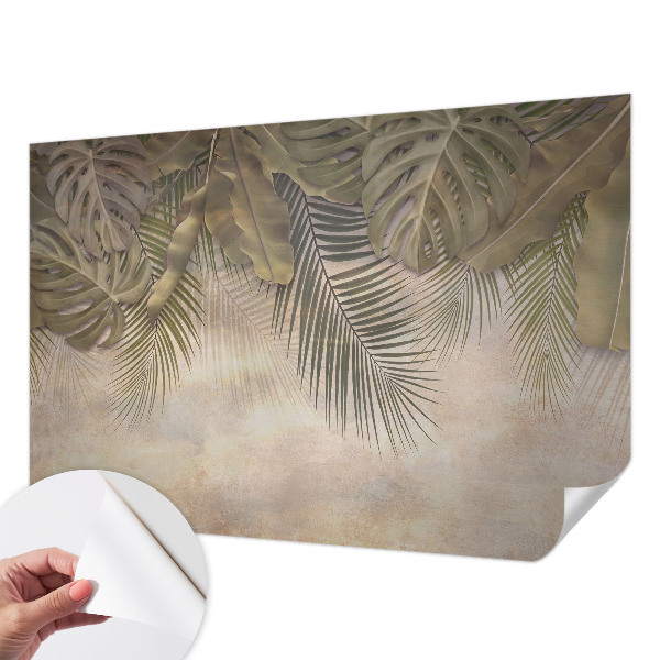 Baby room wall mural with a tropical leaves pattern