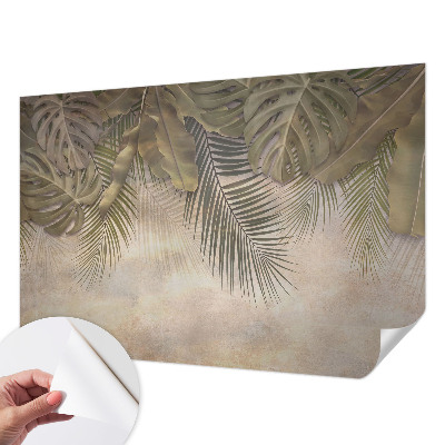 Baby room wall mural with a tropical leaves pattern