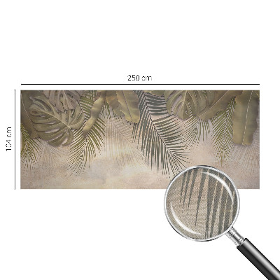 Baby room wall mural with a tropical leaves pattern
