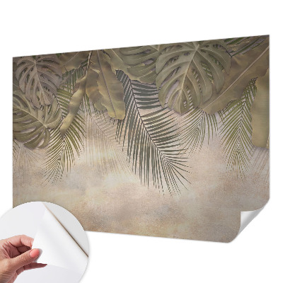 Baby room wall mural with a tropical leaves pattern