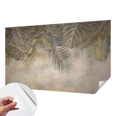 Baby room wall mural with a tropical leaves pattern