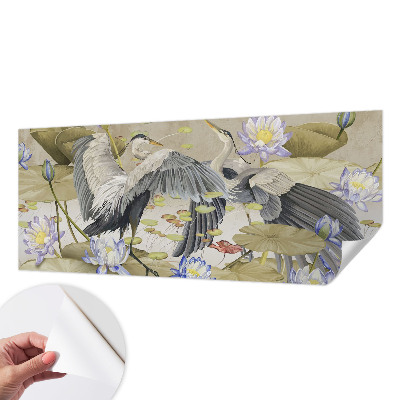 Baby room wall mural with a birds and lilies design