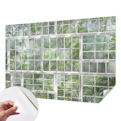 Children's wall mural with a green forest design
