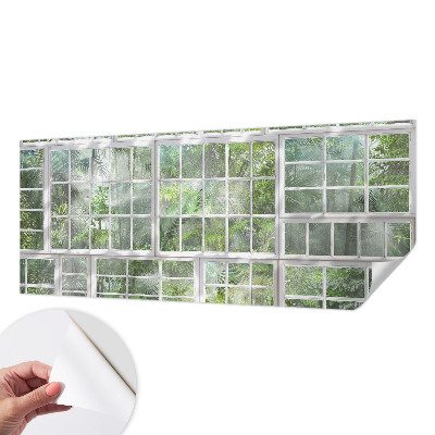 Children's wall mural with a green forest design