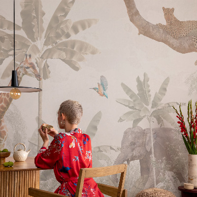 Baby room wall mural with a tropical oasis design