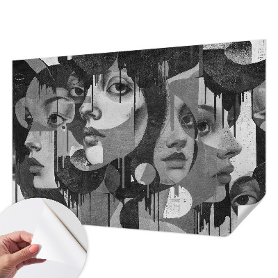 Baby room wall mural with a design of women's faces