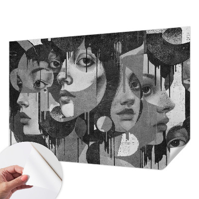 Baby room wall mural with a design of women's faces