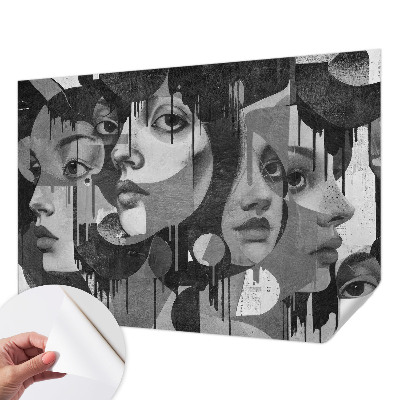 Baby room wall mural with a design of women's faces