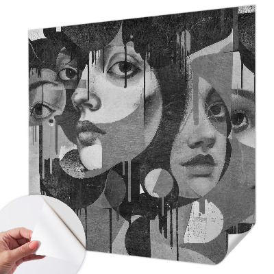 Baby room wall mural with a design of women's faces