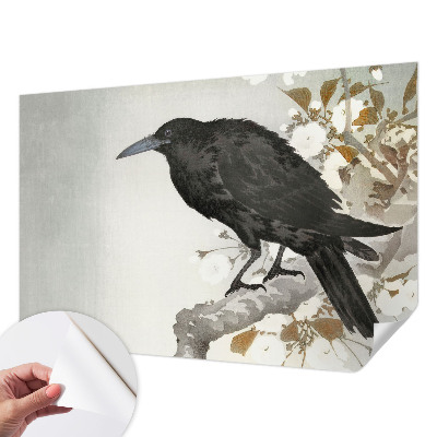 Removable wall mural featuring a raven among flowers
