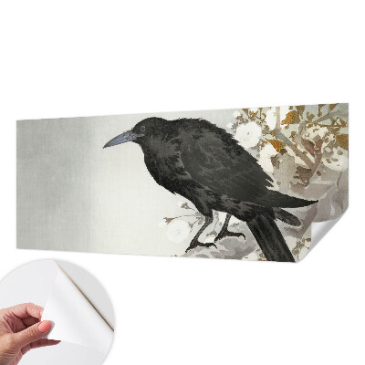 Removable wall mural featuring a raven among flowers