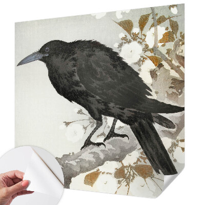Removable wall mural featuring a raven among flowers