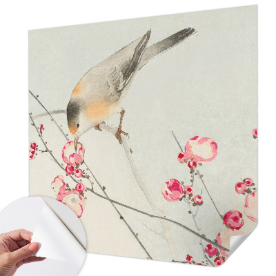 Peel and stick wall mural with a floral and bird design
