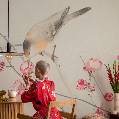 Peel and stick wall mural with a floral and bird design