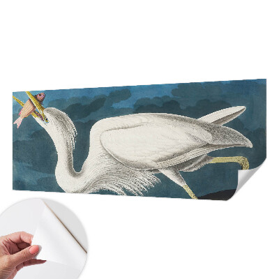 Removable wall mural featuring a bird holding a fish motif