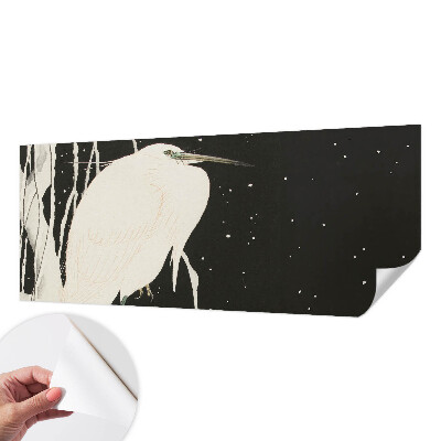 Peel and stick wall mural featuring a winter bird design