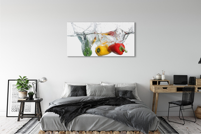 Canvas print Colored peppers in water