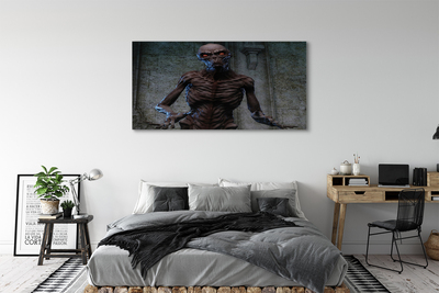 Canvas print The terrible figure in the building
