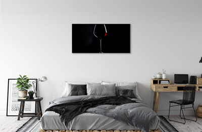 Canvas print Black background with a glass of wine