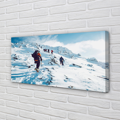 Canvas print Climbing the mountains in winter