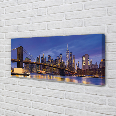 Canvas print Sunset panorama of the sun bridge