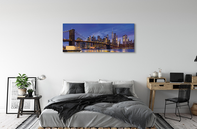 Canvas print Sunset panorama of the sun bridge