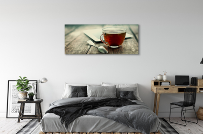 Canvas print Heat a teaspoon of tea