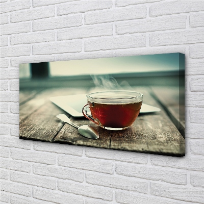 Canvas print Heat a teaspoon of tea