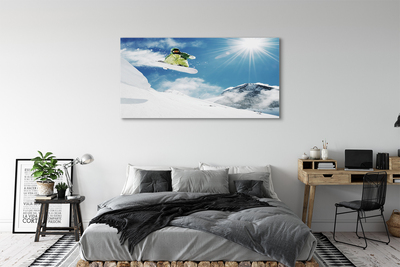 Canvas print Man mountain snowboarding