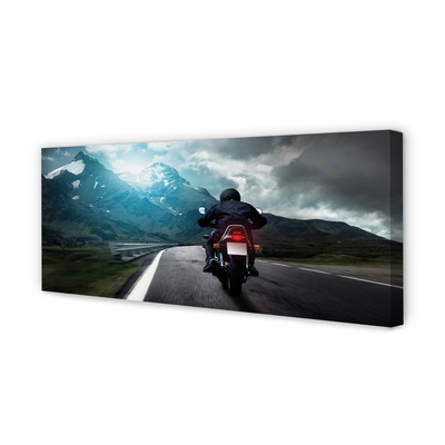 Canvas print Road mountain man sky