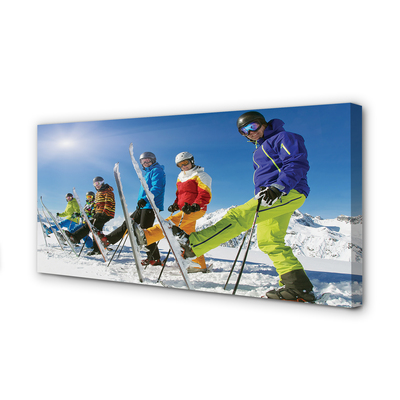 Canvas print Skiers winter in the mountains