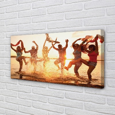Canvas print People in the west sea