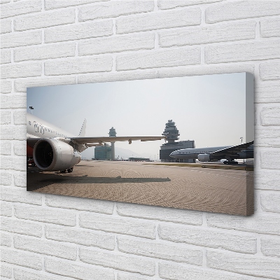 Canvas print Sky building airplane airport