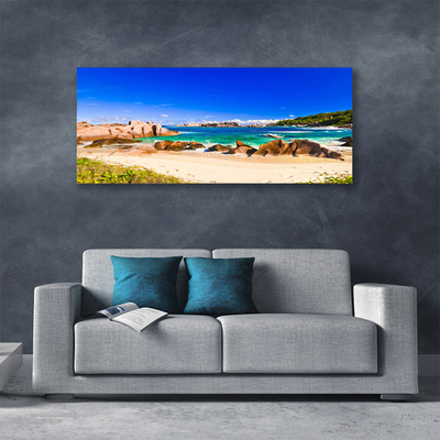 Canvas print Rocky beach sea landscape blue yellow green