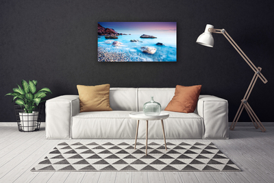 Canvas print Sea stones beach landscape blue grey pink