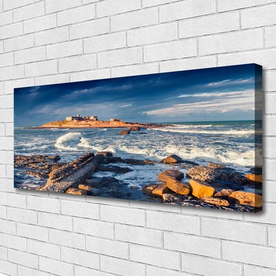 Canvas print Sea stones landscape blue yellow grey