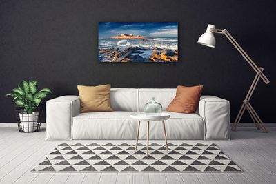 Canvas print Sea stones landscape blue yellow grey