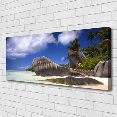 Canvas print Rocky beach landscape grey yellow