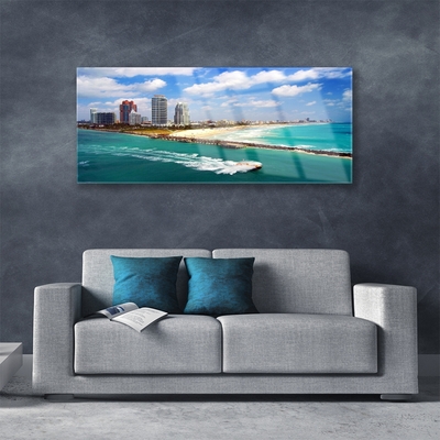 Glass Print Sea beach town landscape blue brown grey