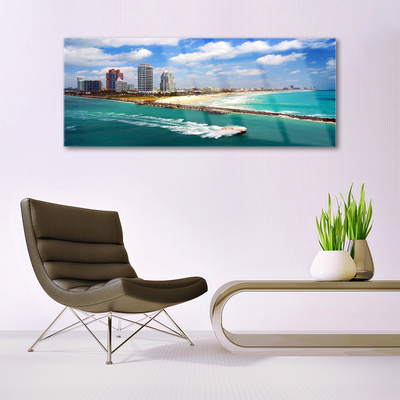 Glass Print Sea beach town landscape blue brown grey