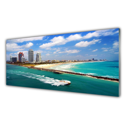 Glass Print Sea beach town landscape blue brown grey