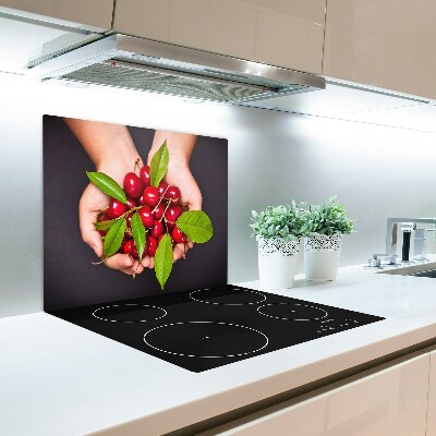 Chopping board Cherries in hands