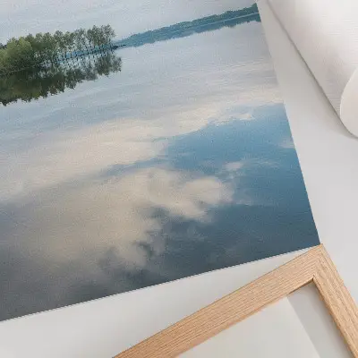 Decorative poster featuring a calm landscape of trees reflected in water under the sky