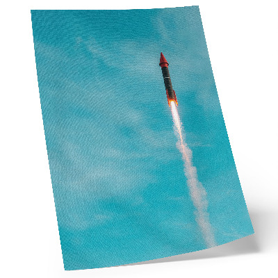 Decorative poster A rocket rising into the blue sky