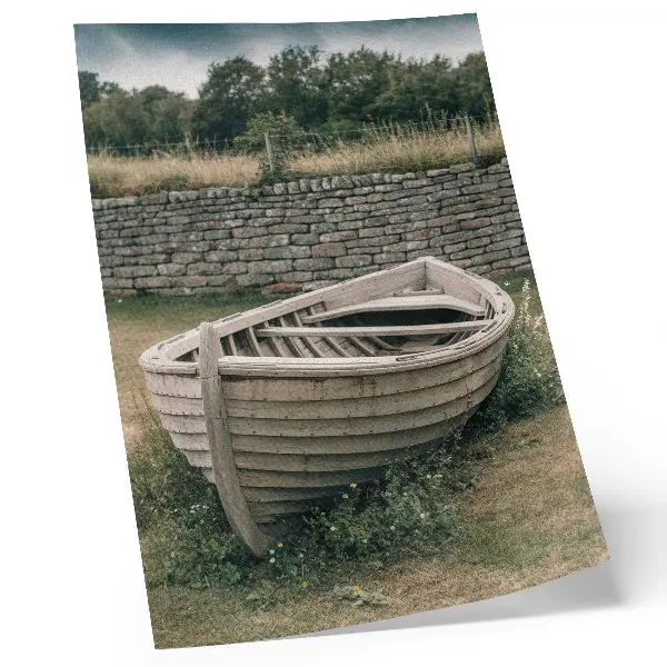 Decorative poster featuring an abandoned boat on a tranquil grassy nature landscape